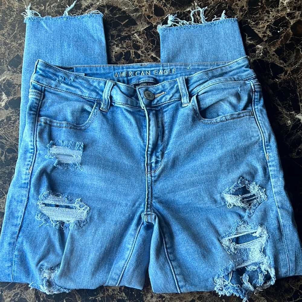 American Eagle jeans. They are so stretchy and comfortable. Size 10 /raw hem